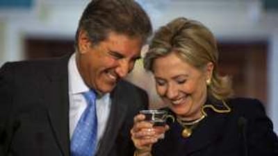 Hillary Clinton, the US secretary of state, with Shah Mehmood Qureshi, the Pakistani foreign minister, at the state department in Washington. Jim Lo Scalzo / EPAHillary Clinton, the US secretary of state, with Shah Mehmood Qureshi, the Pakistani foreign minister, at the state department in Washington.