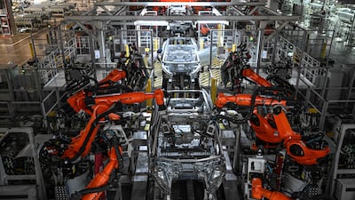 An electric vehicle production line at a factory for Chinese car maker NIO. Gulf funds invested $9.5 billion in China in the year ending September 2024, Deloitte says. AFP