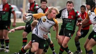 Chris Gregory, centre, and the Dubai Hurricanes won the Premiership last season.