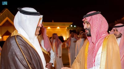 Mohammed bin Salman, Crown Prince of Saudi Arabia, is received by Prince Faisal bin Salman (L), governor of Madinah, during his visit.