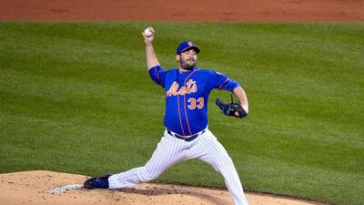 Matt Harvey #33 of the New York Mets pitches against the Chicago Cubs during game one of the 2015 MLB National League Championship Series. Alex Goodlett / Getty Images/AFP