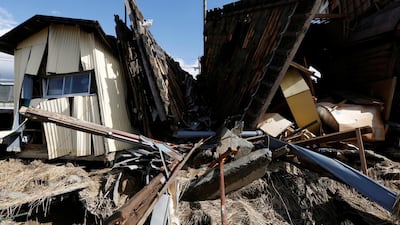 Destroyed houses are seen, in the aftermath of Typhoon Hagibis, in Koriyama, Fukushima prefecture, Japan. REUTERS
