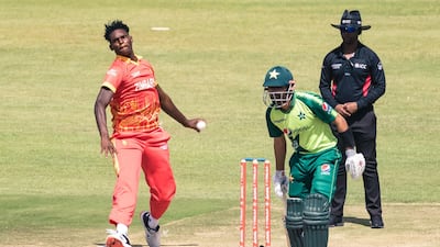 Zimbabwe's Richard Ngarava bowls as Pakistan's Babar Azam looks on at the Harare Sports Club. AFP