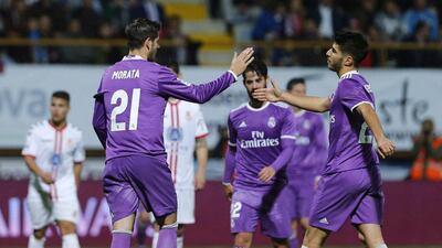 Real Madrid’s Alvaro Morata celebrates scoring the fifth goal. Jose Luis Cereijido / EPA