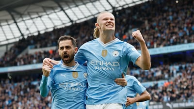 Manchester City's Erling Haaland celebrates with Bernardo Silva after scoring their first goal in the 5-1 Premier League victory over Wolverhampton Wanderers at the Etihad Stadium on Saturday, May 4, 2024. PA