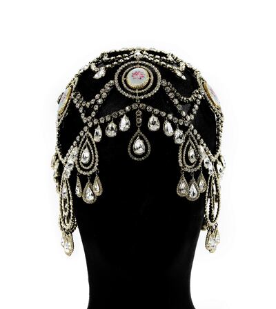 A Christian Dior hair ornament with Swarovski crystals, hand-painted Sèvres porcelain medallions and brass from the brand’s autumn/winter 1999 collection. Courtesy Sotheby's