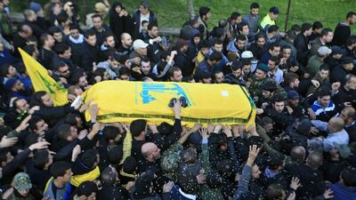 Hizbollah fighters carry the coffin of one of the six members killed in an Israeli airstrike. Photo: Mohammed Zaatari / AP