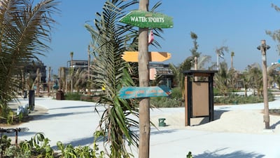 Down by the beach, families can enjoy the safety of shallow waters, or take it easy in water hammocks and shower after a dip in the sea with fresh water buckets.. Christopher Pike / The National.