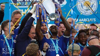 Leicester City lift the Premier League trophy after their win over Everton last weekend. Adrian Dennis / AFP / May 7, 2016