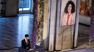 Ali Rahmani, son of Narges Mohammadi, speaks after receiving the Nobel Peace Prize on her behalf at a ceremony in Oslo, Norway on December 10, 2023. NTB / Fredrik Varfjell via Reuters