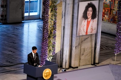 Ali Rahmani, son of Narges Mohammadi, speaks after receiving the Nobel Peace Prize on her behalf at a ceremony in Oslo, Norway on December 10, 2023. Reuters