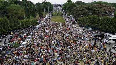 Catholic devotees wave their palm fronds during Palm Sunday celebrations at the Our Lady of Lourdes Grotto shrine in San Jose Del Monte, Bulacan province, Philippines. Reuters