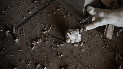A broken statue from the 19th century lays on the floor of the Sursock Palace. AP Photo