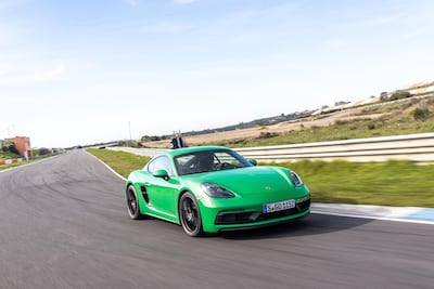 On track, the Cayman puts up a good fight with the bigger 911 Carrera S. Courtesy Porsche
