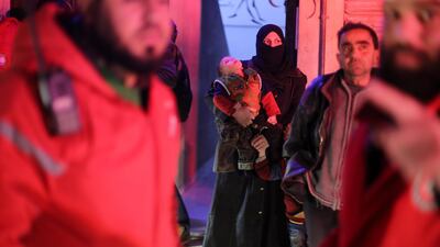 Syrians wait to be transferred from Eastern Ghouta to Damascus. Syrian Red Crescent / EPA