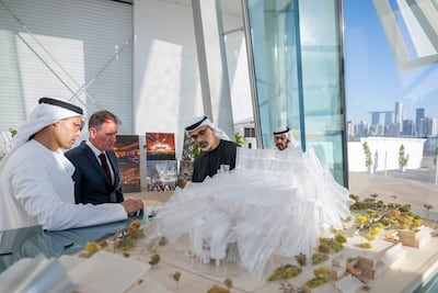 Sheikh Khaled inspects a model of the building. Photo: Abu Dhabi Media Office