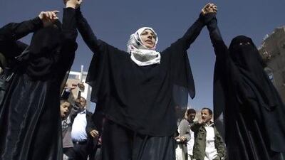 Tawakul Karman, centre, Yemen's Nobel peace laureate, says her country is on the brink of collapse. File / AP Photo