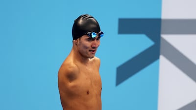 Abbas Karimi leaves the pool after competing in the men's 50m butterfly S5 category heat during the Tokyo 2020 Paralympic Games.