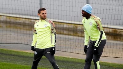 Manchester City's Bernardo Silva, left, is close friends Benjamin Mendy. Reuters