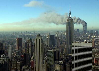 Smoke billows across the New York City skyline after two hijacked planes crashed into the twin towers on September 11, 2001. AP Photo