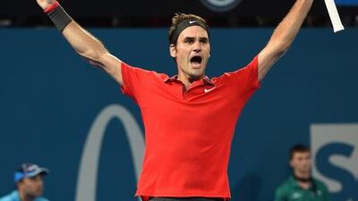 Roger Federer reacts after winning the ATP Brisbane International final on Sunday, the 1,000th singles victory in his career. Dave Hunt / EPA