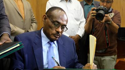 Sudanese Foreign Minister Ahmed al-Dierdiry signs a "preliminary" power-sharing deal between South Sudanese arch-foes, on July 25, 2018, in Khartoum. AFP