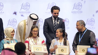Sheikh Mohammed bin Zayed with the winners at the Zayed Future Energy Prize awards ceremony as part of Abu Dhabi Sustainability Week. Chris Whiteoak / The National
