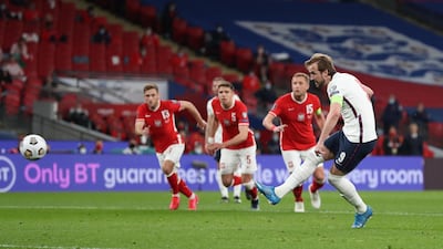 England's Harry Kane scores from the spot. EPA