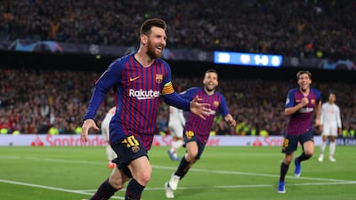 Lionel Messi celebrates after scoring his team's second goal. Catherine Ivill / Getty Images
