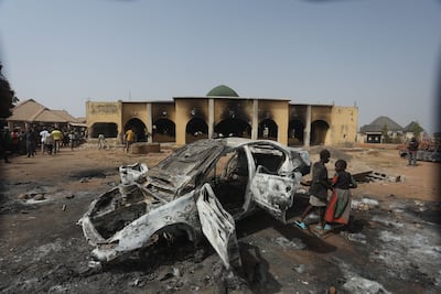 A burnt-out car at the Bungha Central Mosque in Mangu, Nigeria, on February 2, 2024. AFP