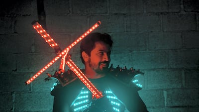 Al Dhahery is a juggler and also uses props such as a lightsabre-like baton. Photo: Reem Mohammed / The National