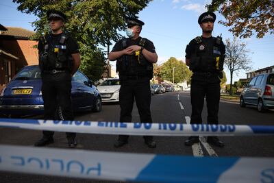 Police officers stand guard after the fatal stabbing of Conservative MP David Amess by a constituent at his office in Leigh-on-Sea in 2021. Getty Images