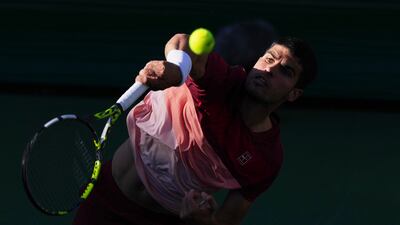 Carlos Alcaraz serves to Jack Draper during their semi-final at the BNP Paribas Open tennis tournament in Indian Wells, California. Draper made it through to the final. AP