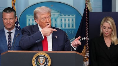 US President Donald Trump speaks about Javelin anti-tank missiles, flanked by Defence Secretary Pete Hegseth and Attorney General Pam Bondi, at a White House press conference. Reuters