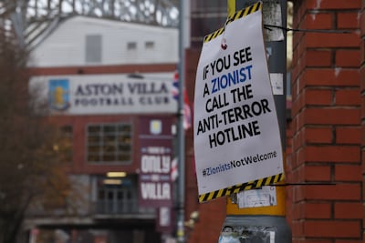 Anti-Israel placards outside Villa Park ahead of the game. EPA