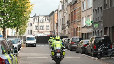 A police cordon set up in a street during an investigation into an alleged attack plot in Antwerp. AP