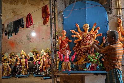 Elaborate idols of Hindu goddess Durga are made for temples and home worship alike. AFP