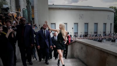 Lisa waves to fans. AP