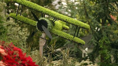 A floral bi-plane on display on the Birmingham City Council garden. Getty Images