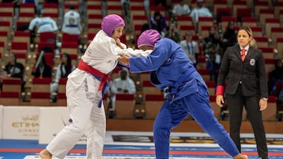 Mathail Al Senani got the better of Fakhera Al Mansooori 15-0 in the blue belt 70kg final at the Abu Dhabi World Youth Jiu-Jitsu Championship. Antonie Robertson / The National