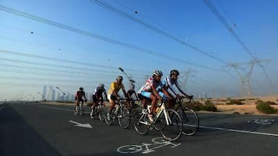 Cyclists have reported that the electric thrill they receive from riding round the Nad Al Sheba bicycle circuit is becoming too literal for comfort. Satish Kumar / The National