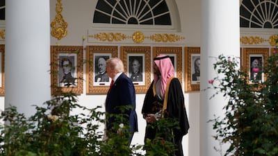 Mr Trump and Prince Mohammed at the White House. AP