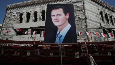 A banner depicting Syrian President Bashar Al Assad in Douma, outside Damascus, Syria. Reuters