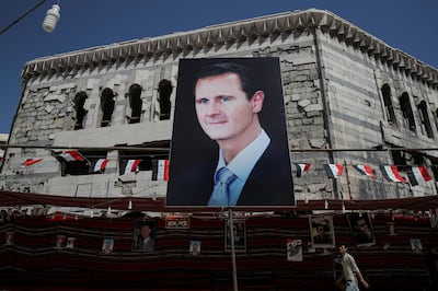 A banner depicting Syrian President Bashar Al Assad in Douma, outside Damascus, Syria. Reuters