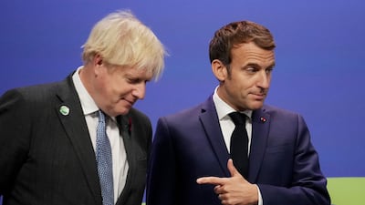 French President Emmanuel Macron and British Prime Minister Boris Johnson. AFP