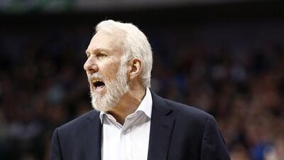 San Antonio Spurs head coach Gregg Popovich is closing in on his 1,000th league win. Jim Cowsert / AP Photo