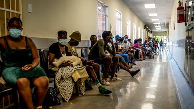 People queue to be vaccinated against Covid-19 in Lenasia South, near Johannesburg. AP Photo