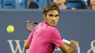 Roger Federer returns a shot to Kevin Anderson in Thursday in his round of 16 straight sets victory at the Cincinnati Masters. Maddie Meyer / Getty Images / AFP