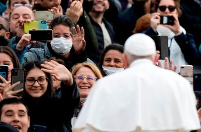 Pope Francis arrives to lead his weekly general audience on St.Peter's square on February 26, 2020. AFP
