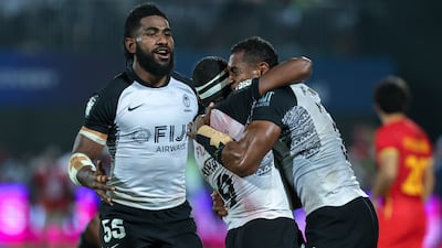 Fiji players celebrate their win. Victor Besa / The National